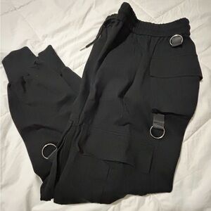 The Kript pants Wear Side Flap Pocket Tape Panel Cargo Pants.